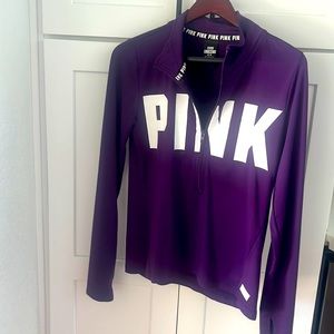 Pink athletic sweater